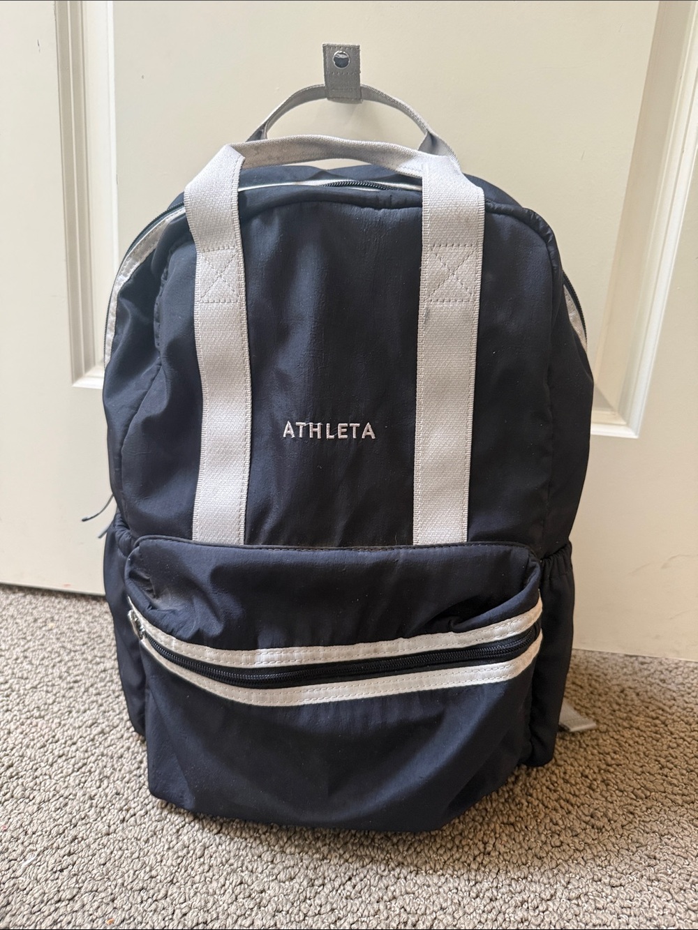 Athleta Black and White Men's Backpack with Front Zip Pocket